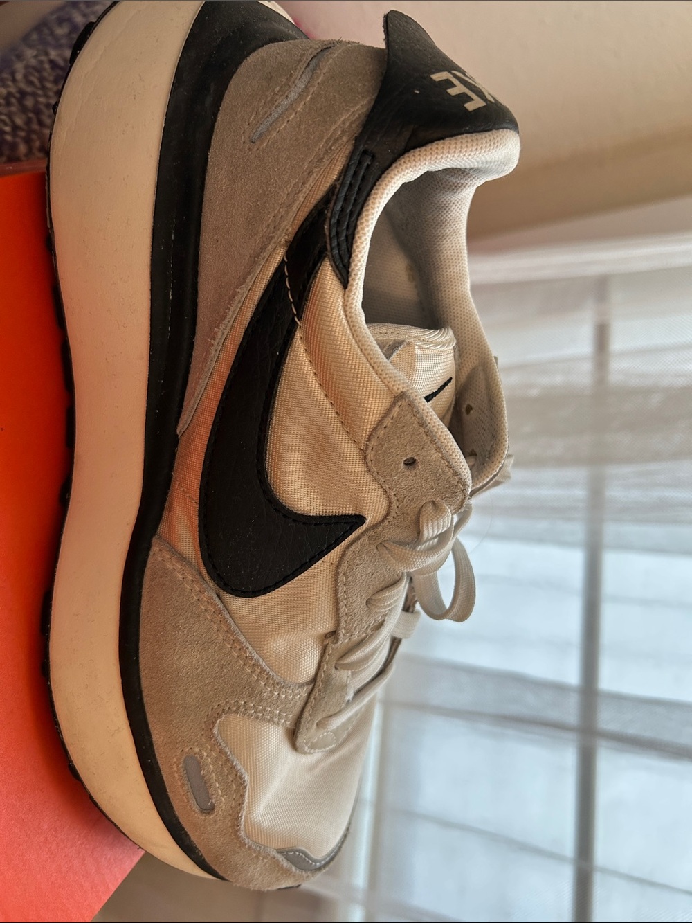 Nike women’s Beige and Black Trail-Inspired Sneakers